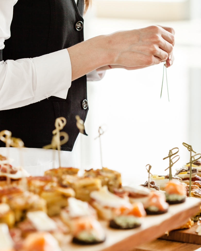 Service team preparing premium buffet table
